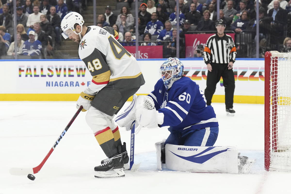 Vegas Golden Knights' Tomas Hertl (48) gathers the puck in front of Toronto Maple Leafs' goalte ...