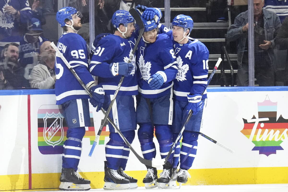 Toronto Maple Leafs' William Nylander (88) celebrates with John Tavares (91) Mitch Marner (16) ...