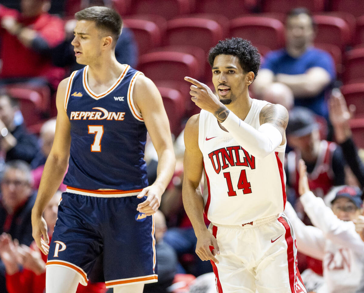 UNLV guard Jailen Bedford (14) celebrates a basket during the college basketball game against t ...