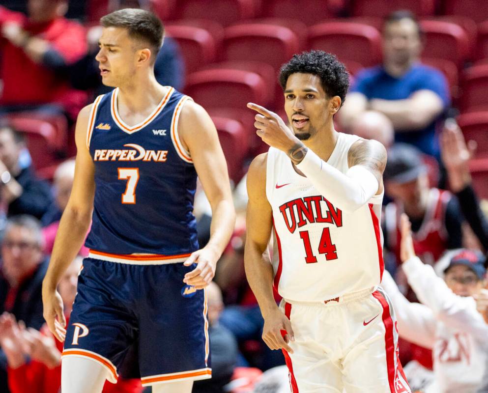 UNLV guard Jailen Bedford (14) celebrates a basket during the college basketball game against t ...