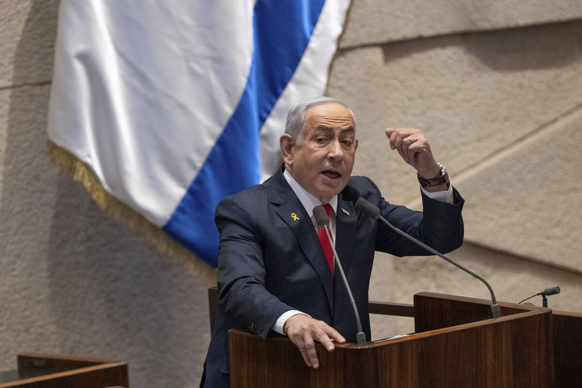 Israel's Prime Minister Benjamin Netanyahu addresses lawmakers in the Knesset, Israel's parliam ...