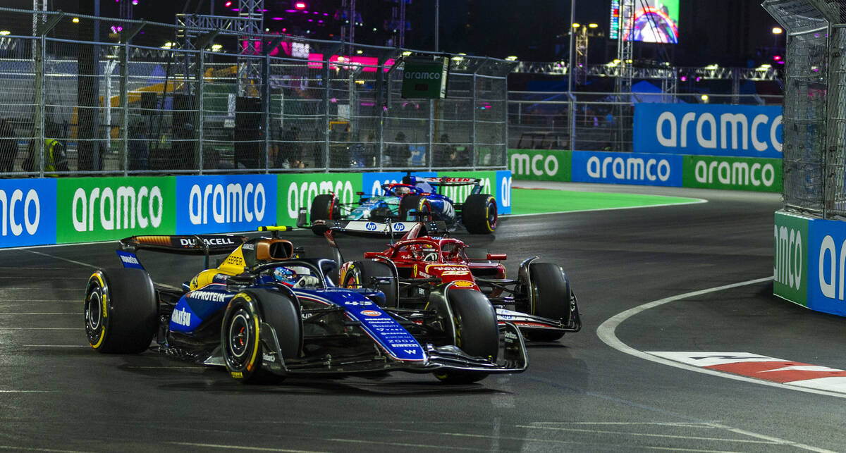 Williams driver Franco Colapinto leads Ferrari driver Charles Leclerc around a turn at the Sphe ...