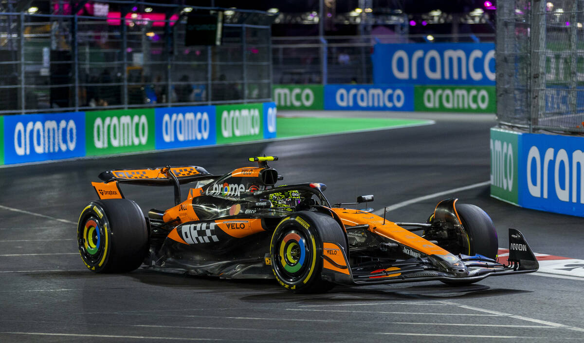 McLaren driver Lando Norris turns a corner at the Sphere during the first Formula One opening p ...