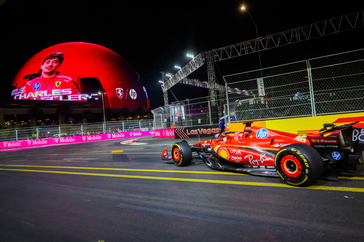 Formula 1 Ferrari Charles Leclerc speeds past the Sphere showing his face above the circuit dur ...