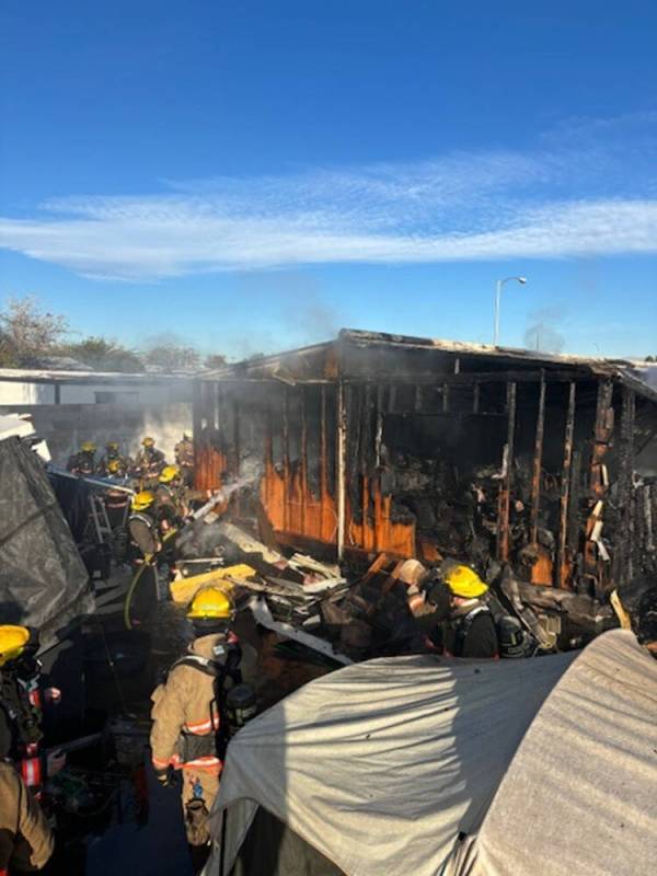 Crews battle a house fire Thursday, Nov. 21, 2024, on the 4700 block of&#xa ...