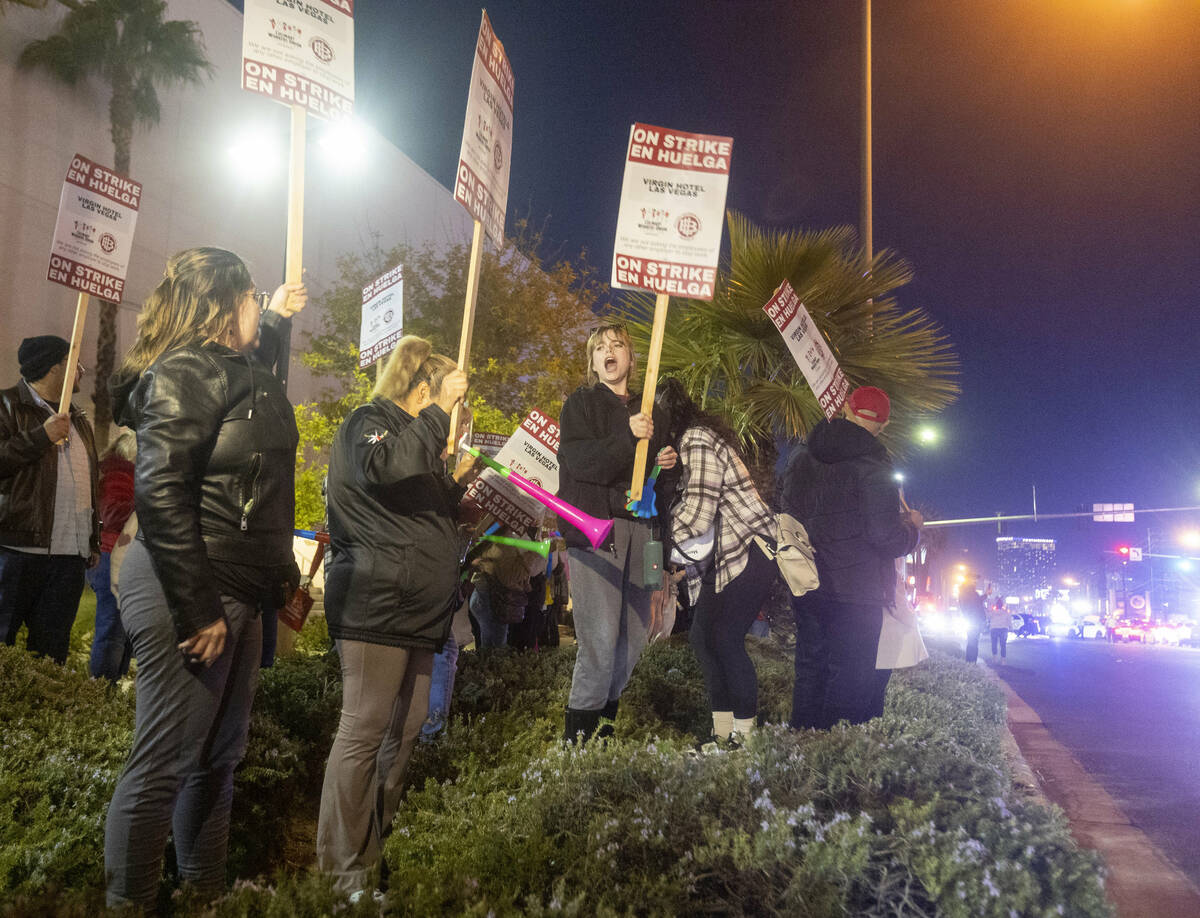 Culinary Workers Union members and Virgin Hotels workers protest outside of the Virgin Hotels, ...