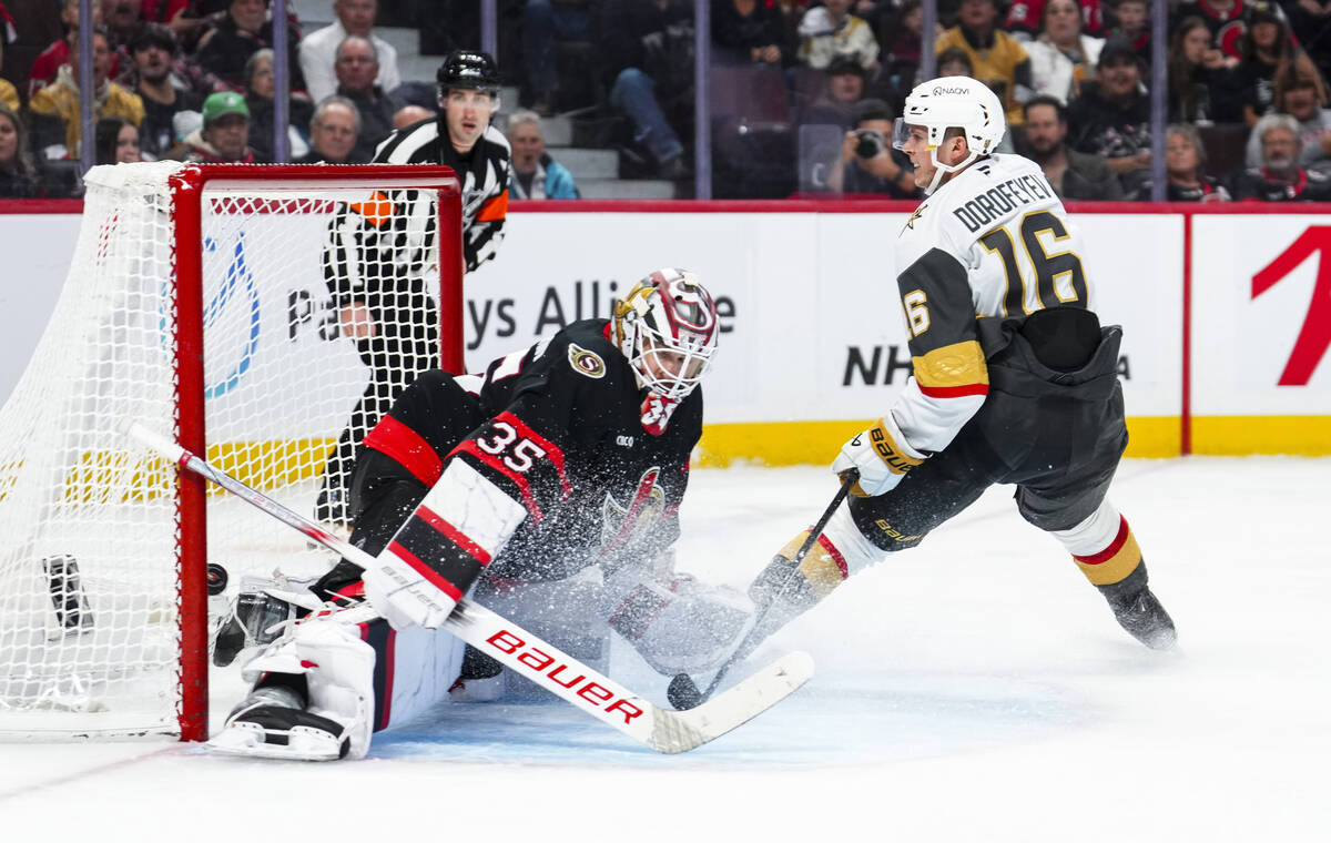 Vegas Golden Knights left wing Pavel Dorofeyev (16) scores on Ottawa Senators goaltender Linus ...