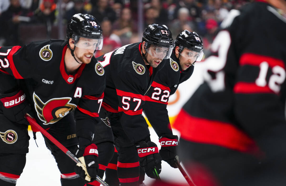 Ottawa Senators defenseman Thomas Chabot (72), left wing David Perron (57), and right wing Mich ...