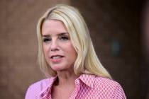 Pam Bondi, former Florida Attorney General, speaks to reporters outside an election integrity v ...