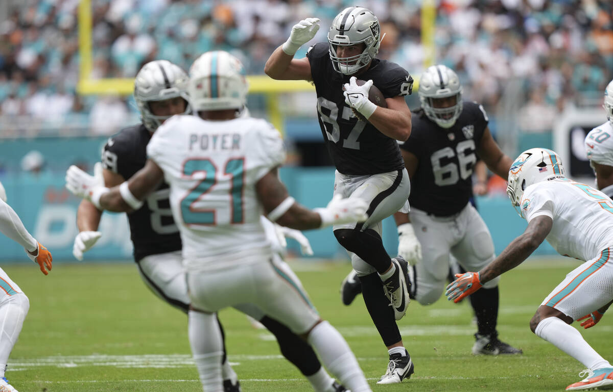 Las Vegas Raiders tight end Michael Mayer runs during the first half of an NFL football game ag ...