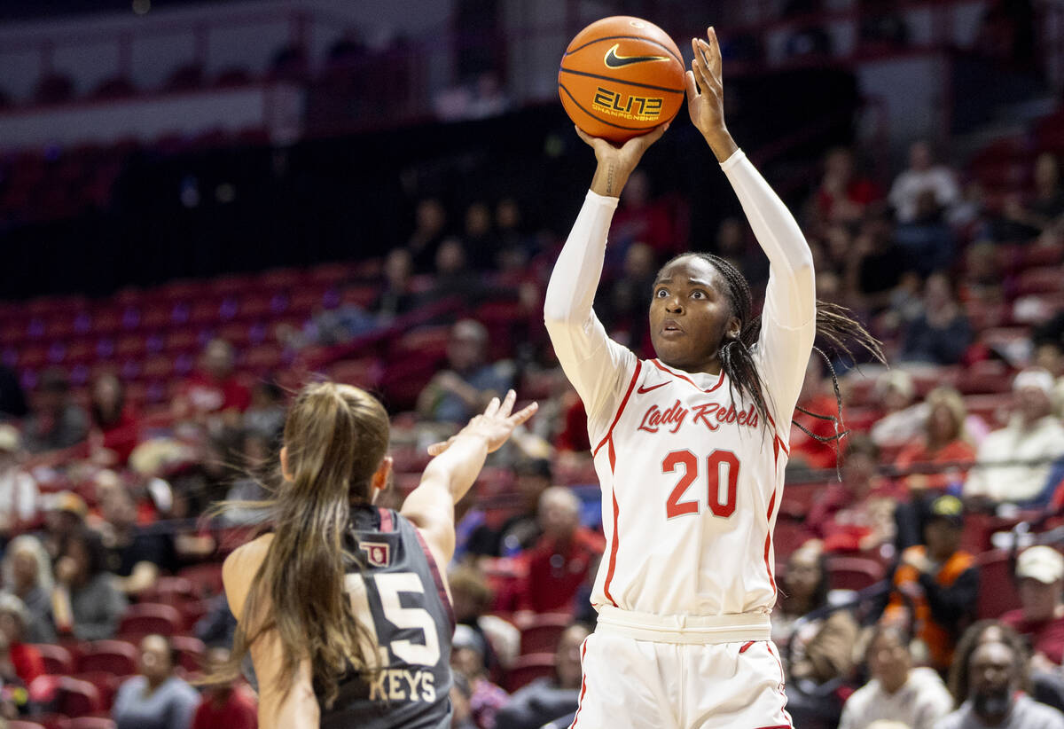 UNLV forward Macie James (20) attempts a shot during the college basketball game against the Ok ...