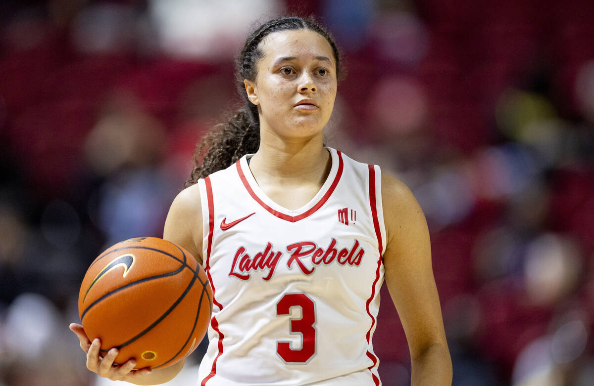 UNLV guard Kiara Jackson (3) controls the ball during the college basketball game against the O ...