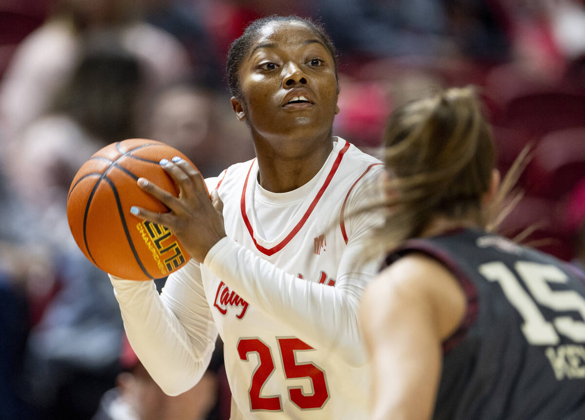 UNLV guard Aaliyah Alexander (25) looks to pass the ball during the college basketball game aga ...