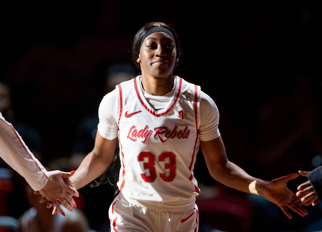 UNLV guard Amarachi Kimpson (33) runs onto the court while being introduced before the college ...