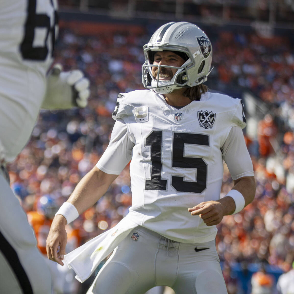 Raiders quarterback Gardner Minshew (15) smiles during the first half of an NFL game against th ...