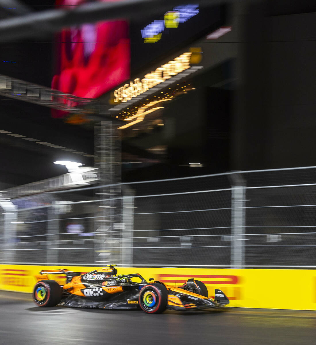 McLaren driver Lando Norris turns along E. Harmon Avenue during the third practice round for th ...