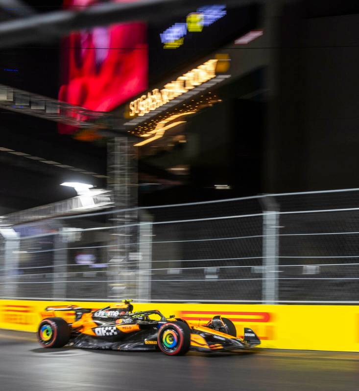 McLaren driver Lando Norris turns along E. Harmon Avenue during the third practice round for th ...