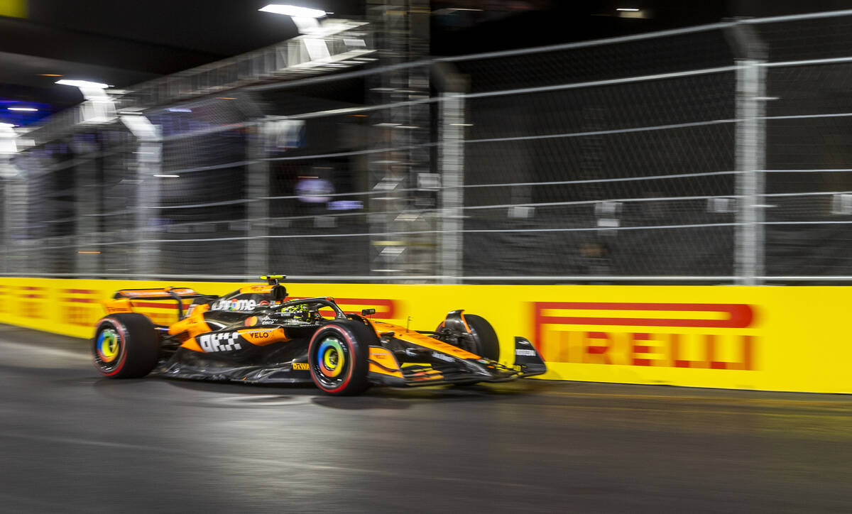 McLaren driver Lando Norris turns along E. Harmon Avenue during the third practice round for th ...