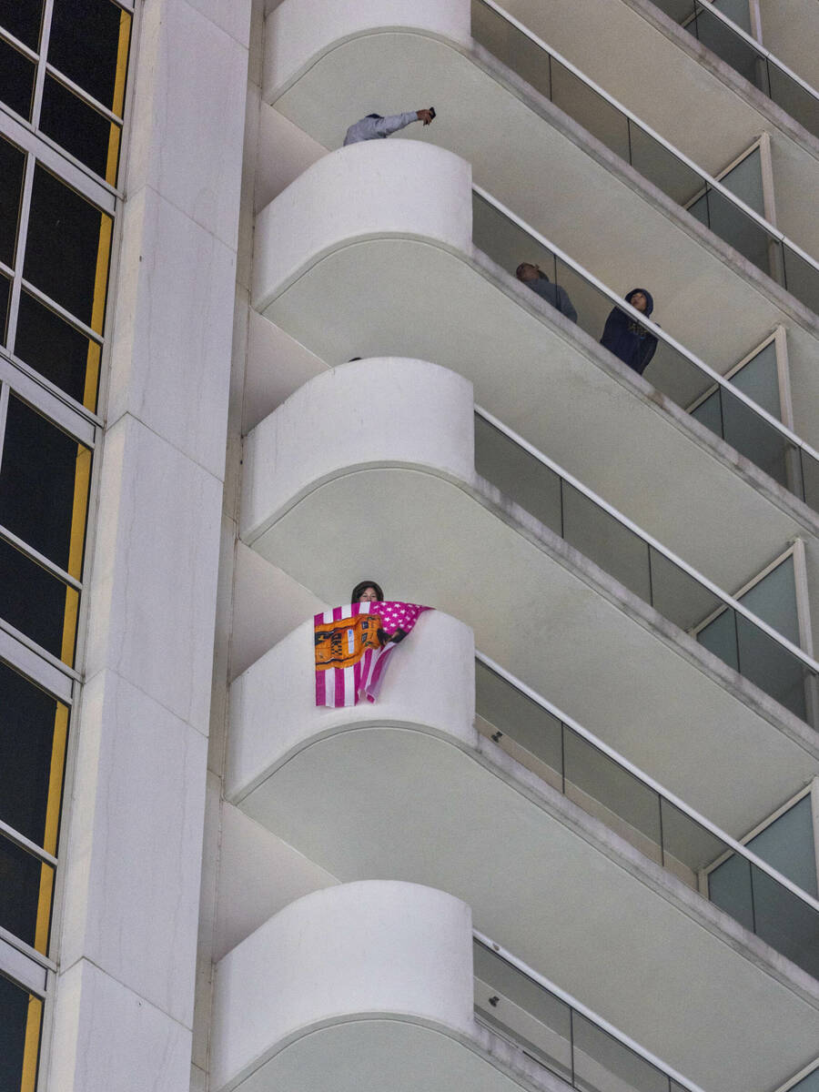 Fans watch from apartments above E. Harmon Avenue during the third practice round for the Formu ...