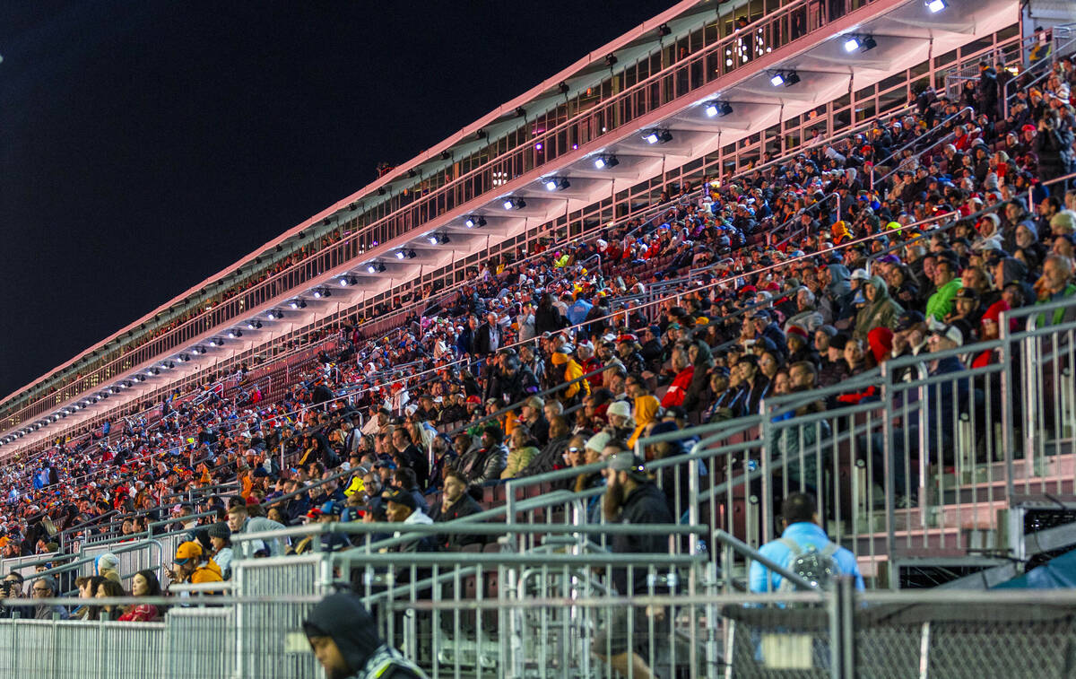 Fans watch the race from the main grandstand during the third practice round for the Formula 1 ...