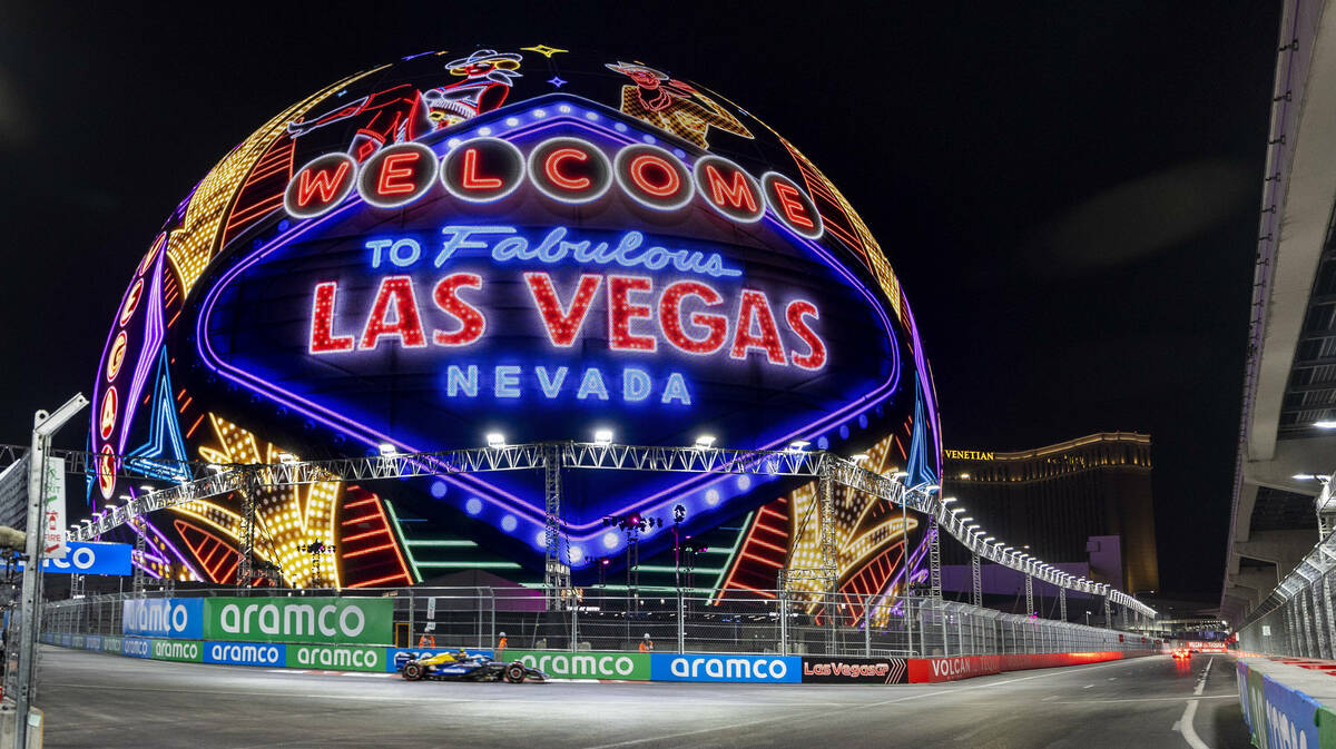 A race care navigates around the MSG Sphere during the qualifying round for the Formula 1 Las V ...