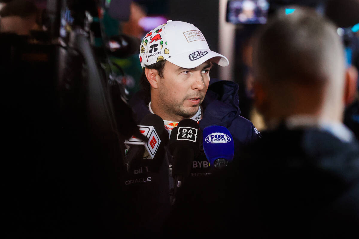 Formula 1 Red Bull Racing driver Sergio Perez speaks to the press during a qualifying race ahea ...