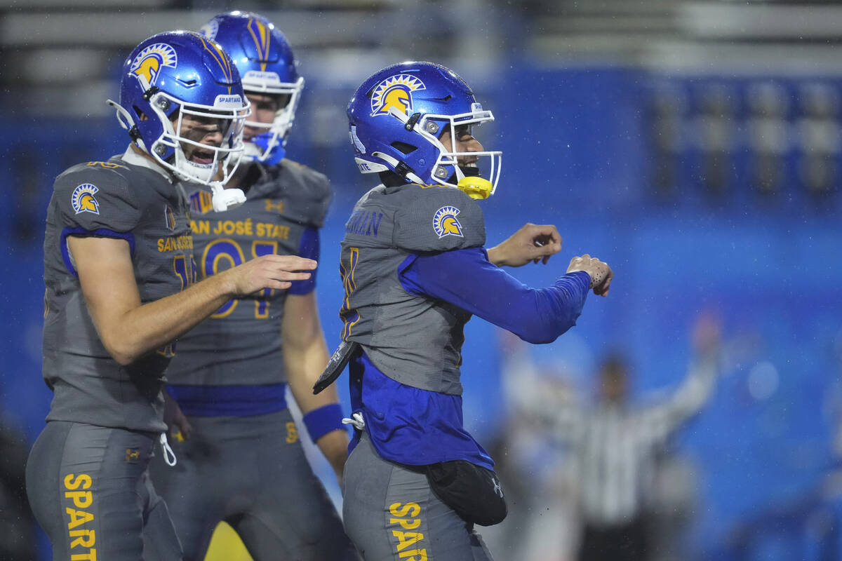 San Jose State wide receiver Matthew Coleman, right, celebrates with teammates after scoring a ...