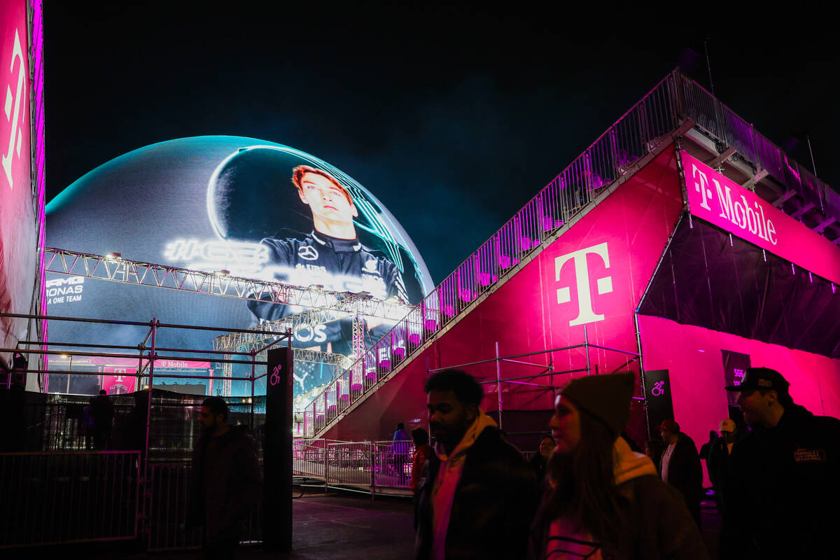 Formula 1 driver George Russell is shown on the sphere from the T-Mobile fan zone during a Form ...