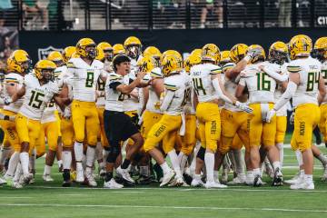 Bishop Manogue celebrates their win over Faith Lutheran during a class 5A Division II state cha ...