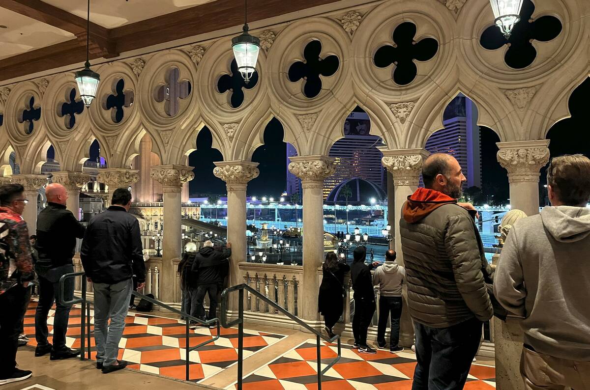 By 10:30 p.m., a crowd had formed near the outside entrance of the Venetian's Grand Canal shops ...