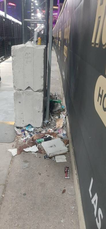 Noticeable trash piles are building up in certain areas where pedestrians have to walk along La ...