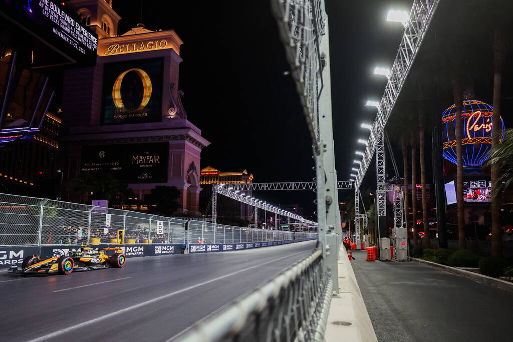 Formula 1 McLaren driver Land Norris zooms by during the Formula 1 Las Vegas Grand Prix on the ...