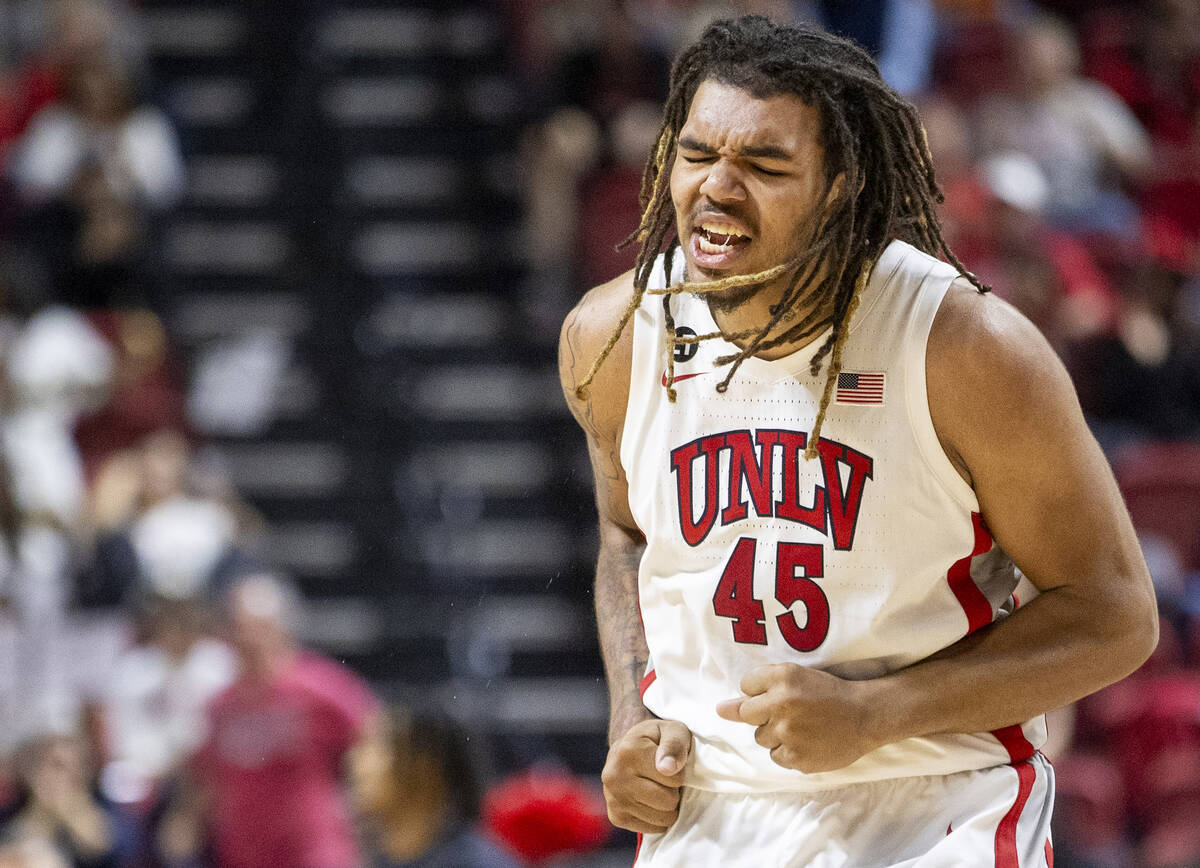 UNLV forward Jeremiah Cherry (45) celebrates a play during the college basketball game against ...