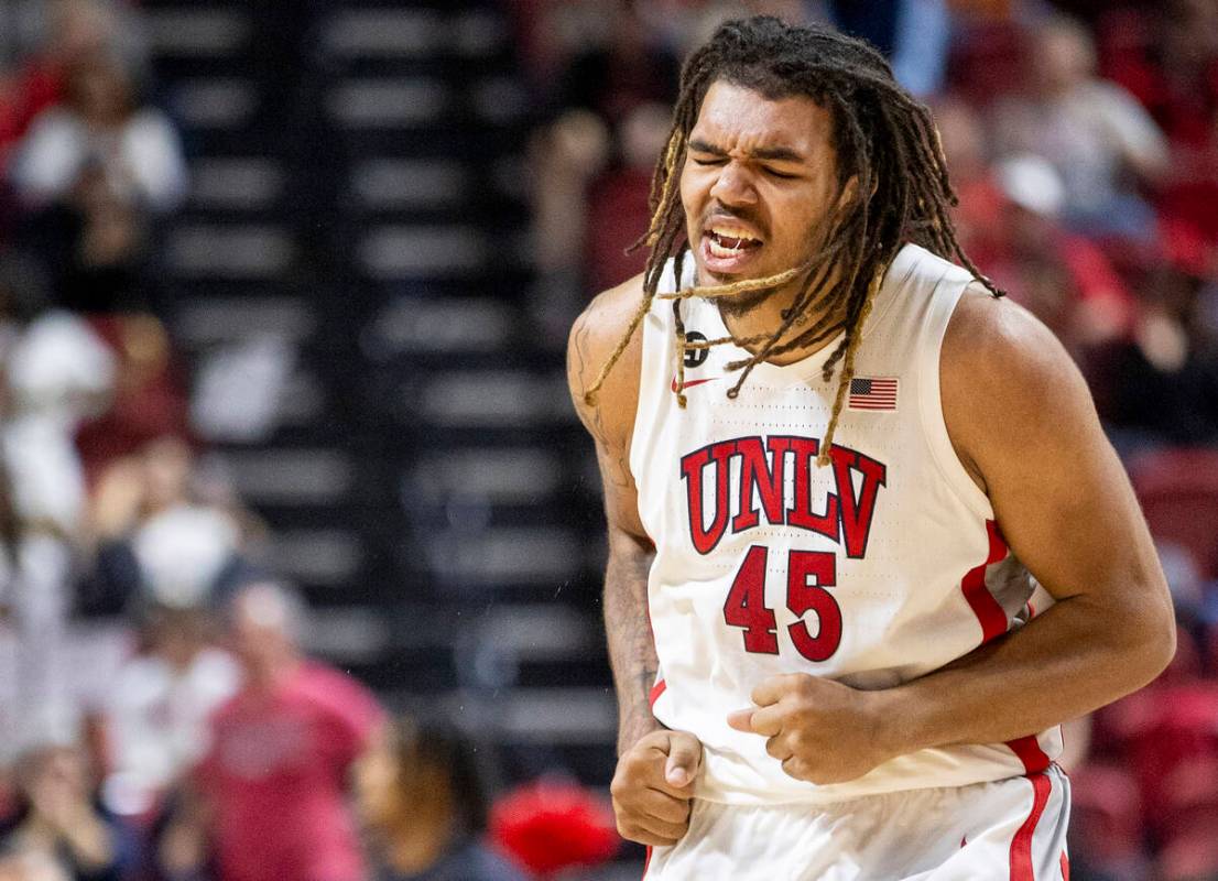 UNLV forward Jeremiah Cherry (45) celebrates a play during the college basketball game against ...