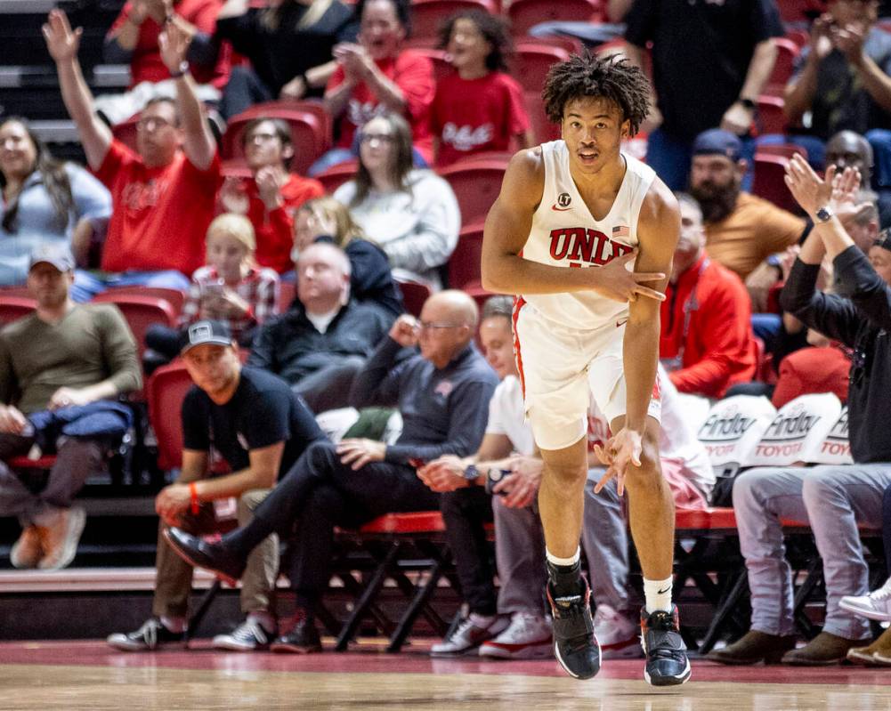 UNLV guard Dedan Thomas Jr. (11) celebrates after scoring a three-pointer during the college ba ...