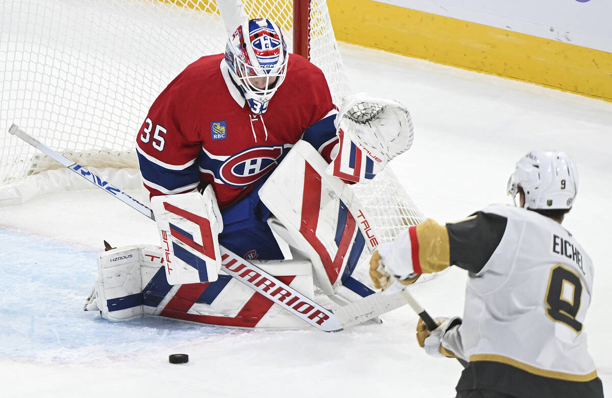 Vegas Golden Knights' Jack Eichel (9) takes a shot on Montreal Canadiens goaltender Sam Montemb ...