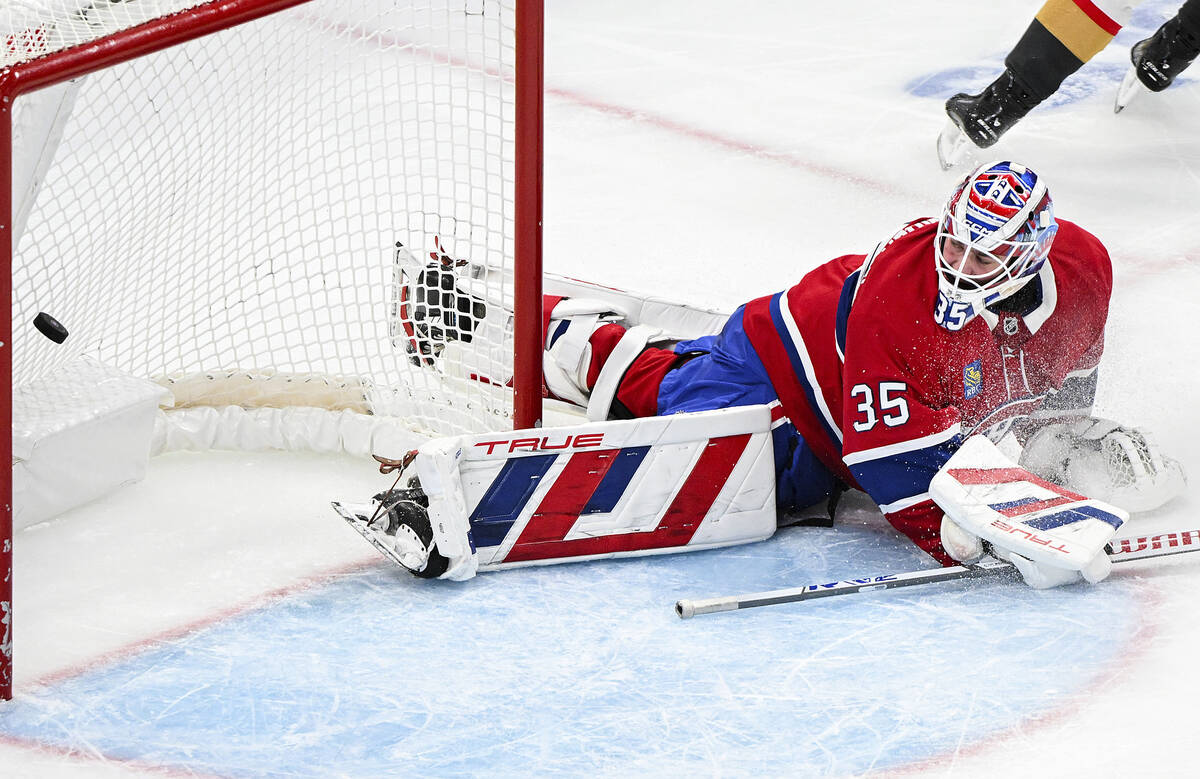 Montreal Canadiens goaltender Sam Montembeault looks back on his net after being scored on by V ...