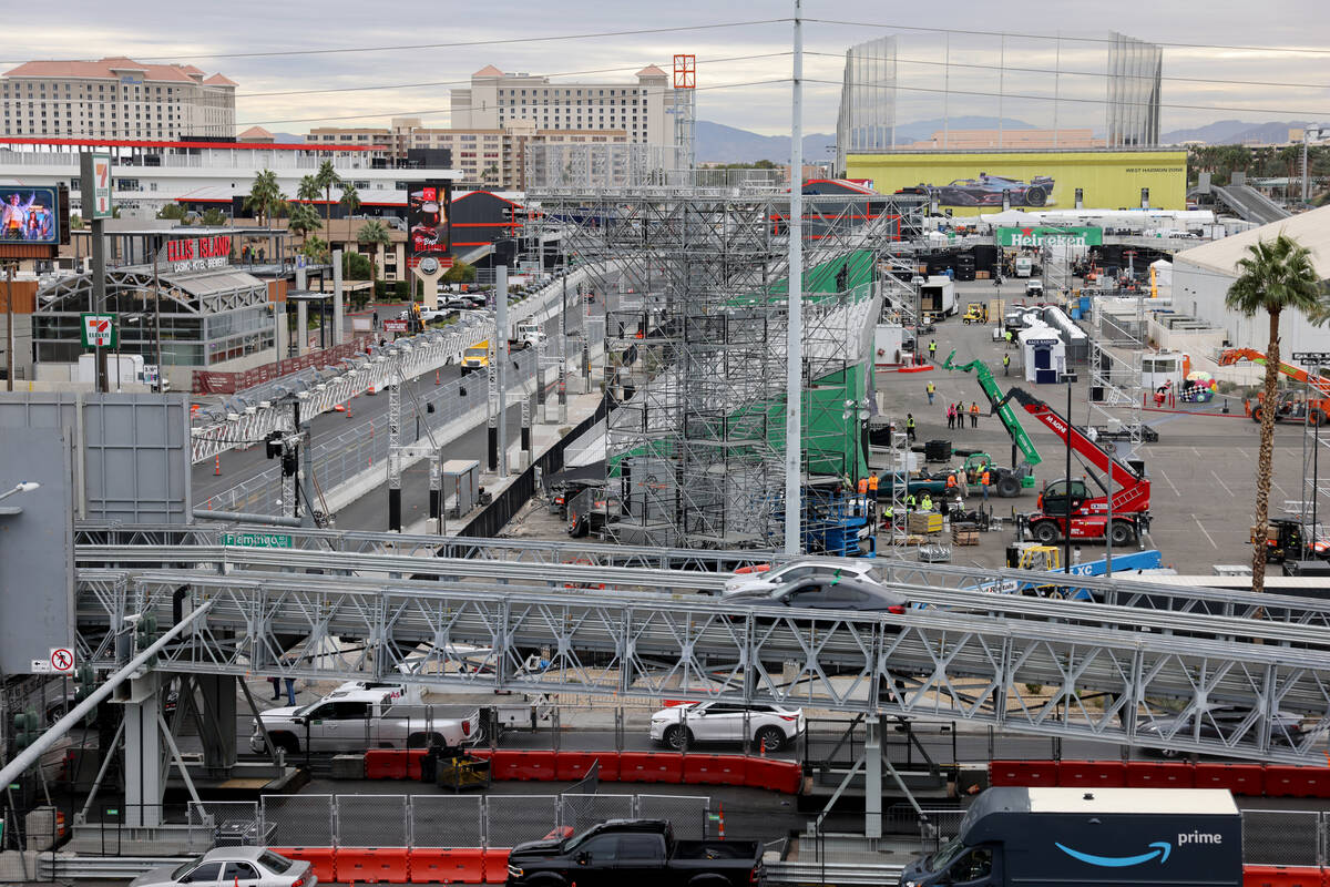 Workers dismantle the Formula One Las Vegas Grand Prix track on Koval Lane at Flamingo Road in ...