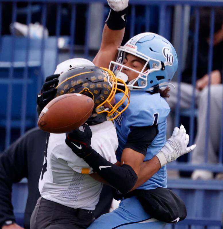 Galena High defensive back Erick Rodriguez (3) commits pass interference as Centennial High's w ...