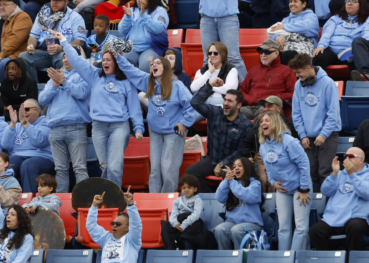 Centennial High fans cheer for their team during their Class 5A Division III football state cha ...