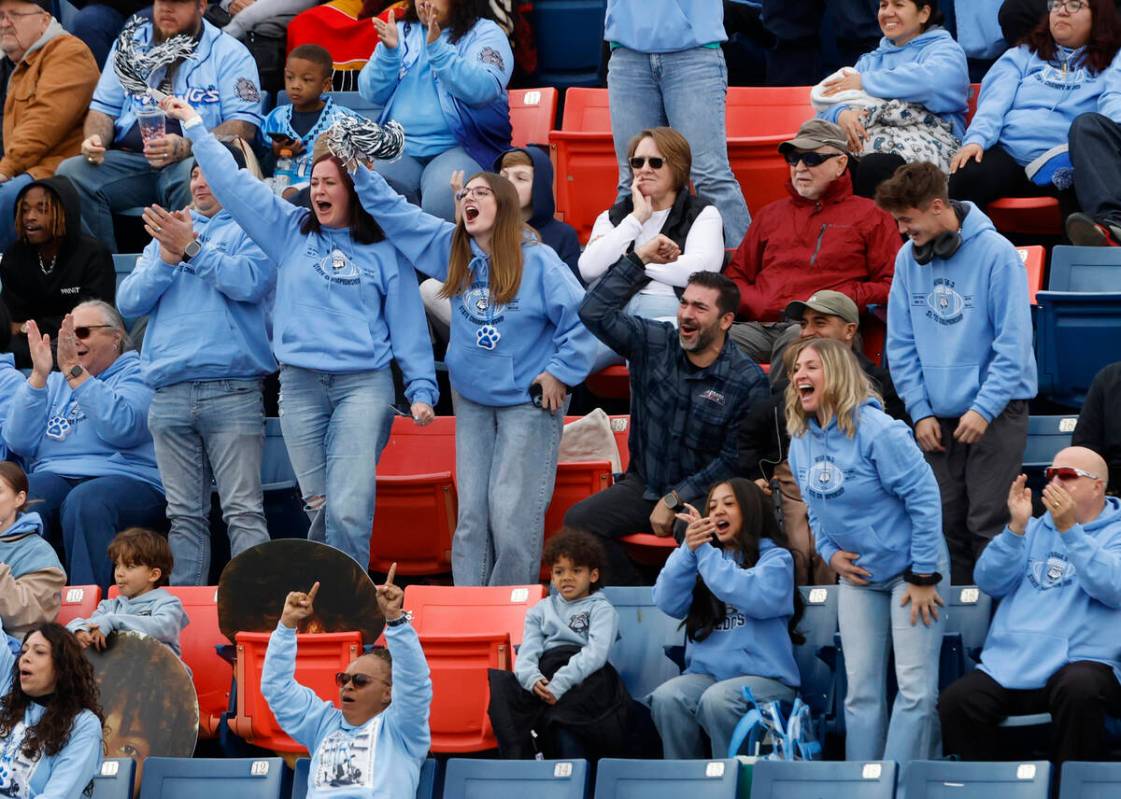 Centennial High fans cheer for their team during their Class 5A Division III football state cha ...