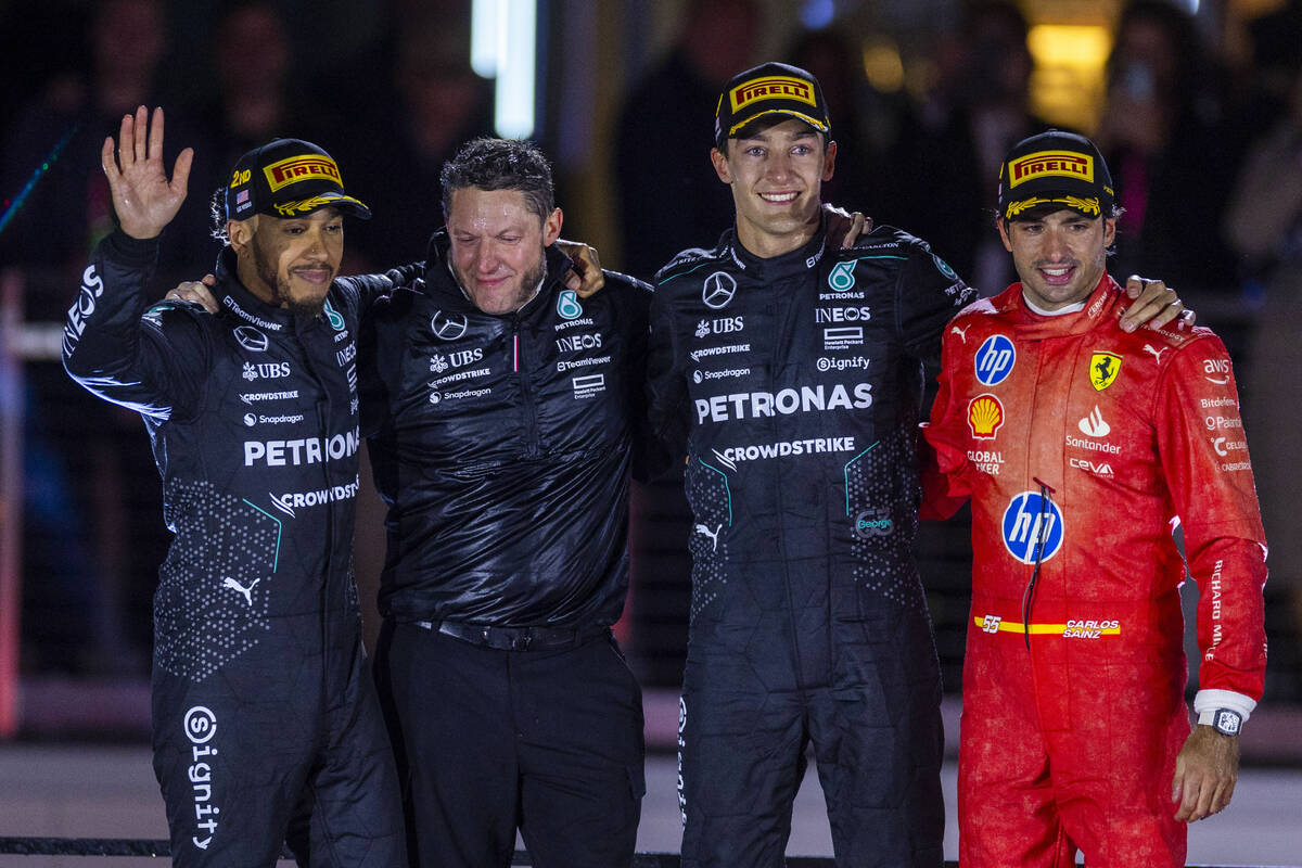 Mercedes driver Lewis Hamilton, a teammate and George Russell with Ferrari driver Carlos Sainz ...