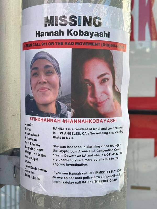 A flyer with information on Hannah Kobayashi, currently missing, is displayed Thursday, Nov. 21 ...