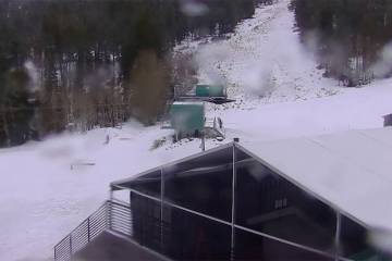 Skiers and snowbirds at the base of Lee Canyon as rain and snow falls on Monday, Nov 25, 2024. ...