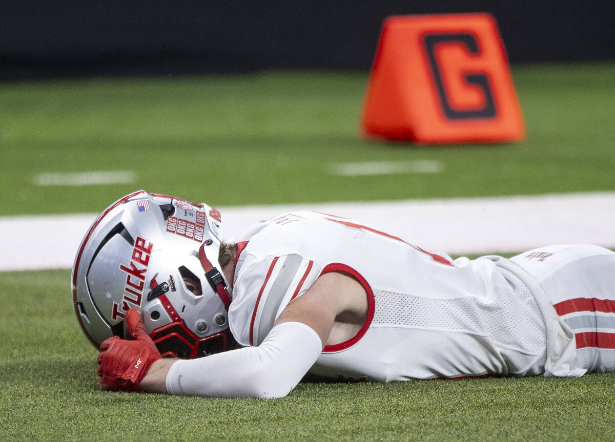 Truckee senior Logan Arata (10) buries his face in his hands after missing a potential scoring ...