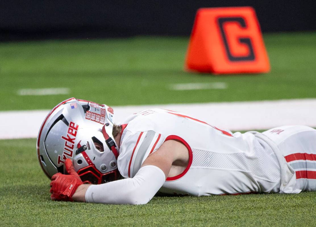 Truckee senior Logan Arata (10) buries his face in his hands after missing a potential scoring ...