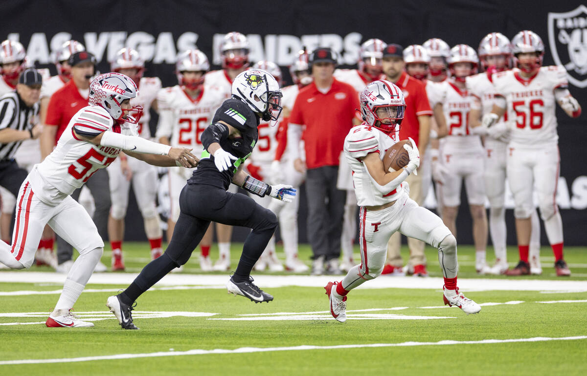 Truckee sophomore Ivan Esparza (24) runs with the ball during the Class 3A football state champ ...