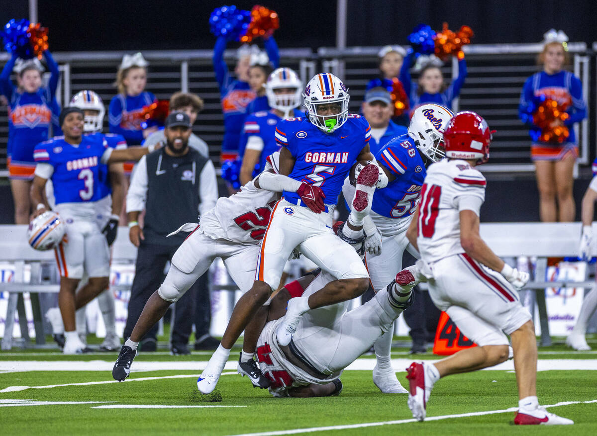 Bishop Gorman defensive back Jett Washington (5) runs back n interception against Arbor View du ...