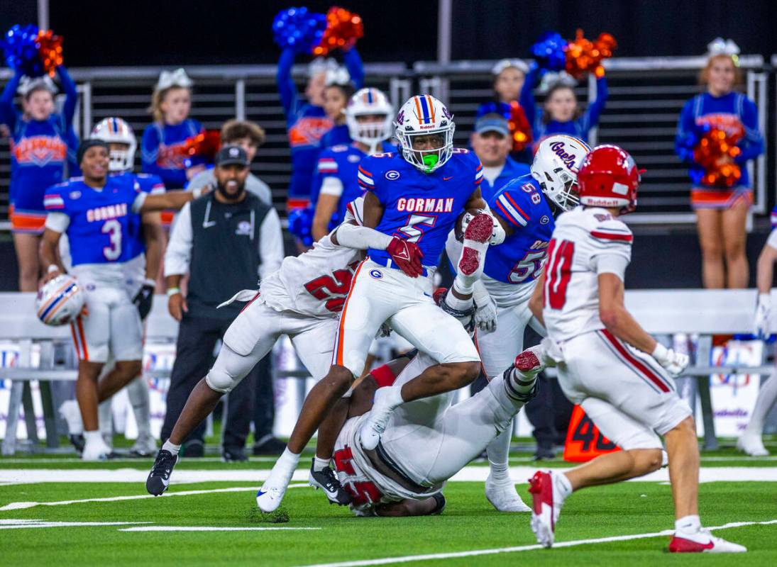 Bishop Gorman defensive back Jett Washington (5) runs back n interception against Arbor View du ...