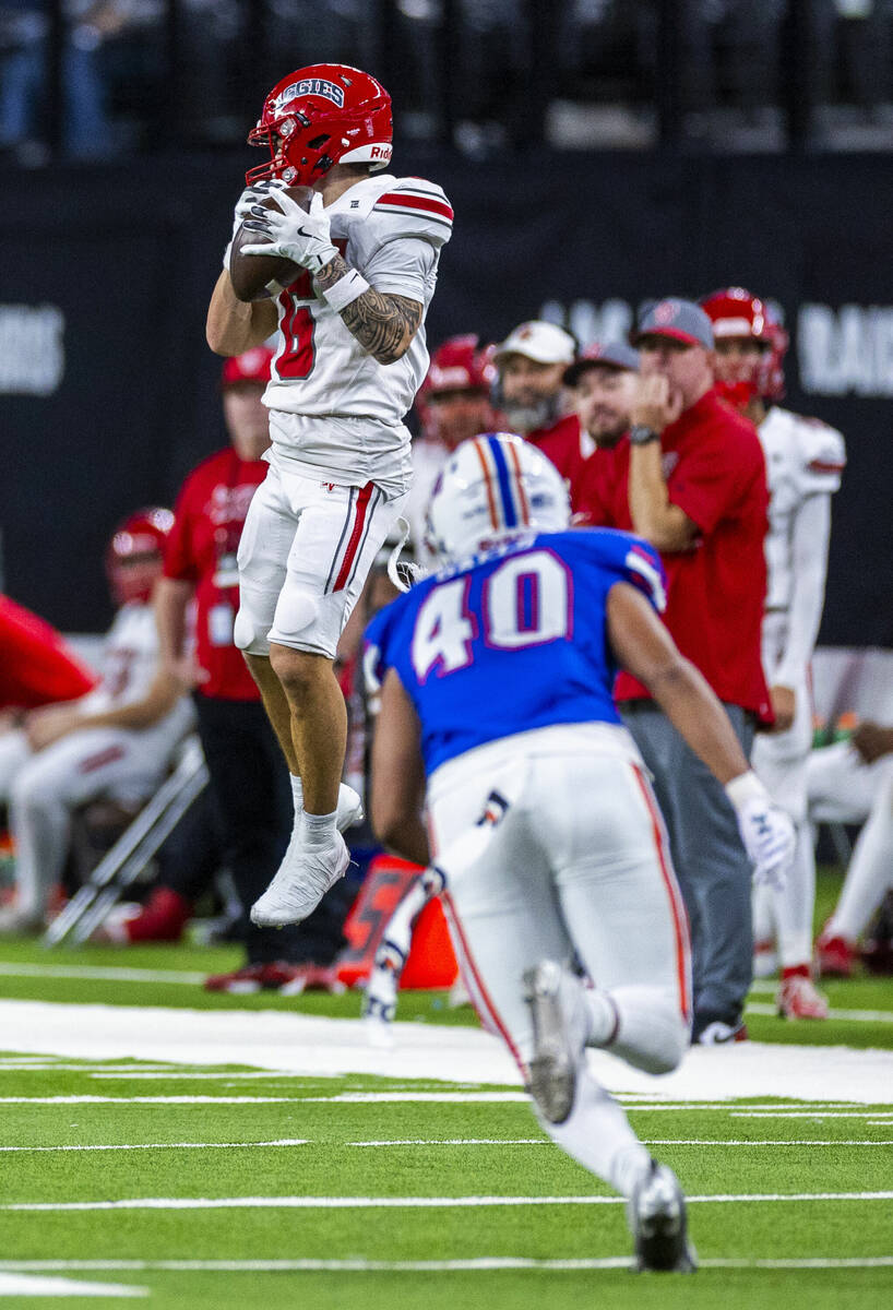 Arbor View wide receiver Jayden Williams (6) elevates for a catch as Bishop Gorman linebacker C ...